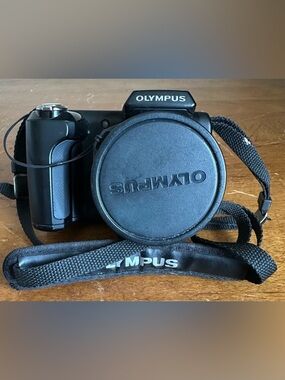 Olympus SP-610UZ 14 MP HD/3D 22x Wide Optical Zoom Compact Digital Camera